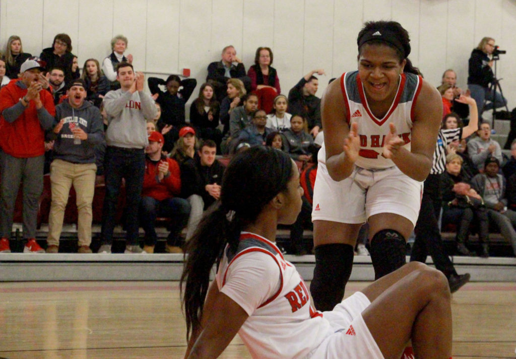 Players Tiarra Dillard and Taylor Harmon motivated each other during the close game. Photo Credit: Therese Sheridan
