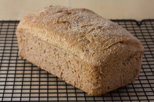 Vegan_no-knead_whole_wheat_bread_loaf,_September_2010