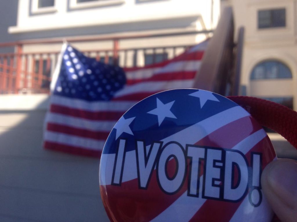 Students who voted received an "I Voted!" button for coming out to the polls. Photo Credit: Jayna Gugliucci