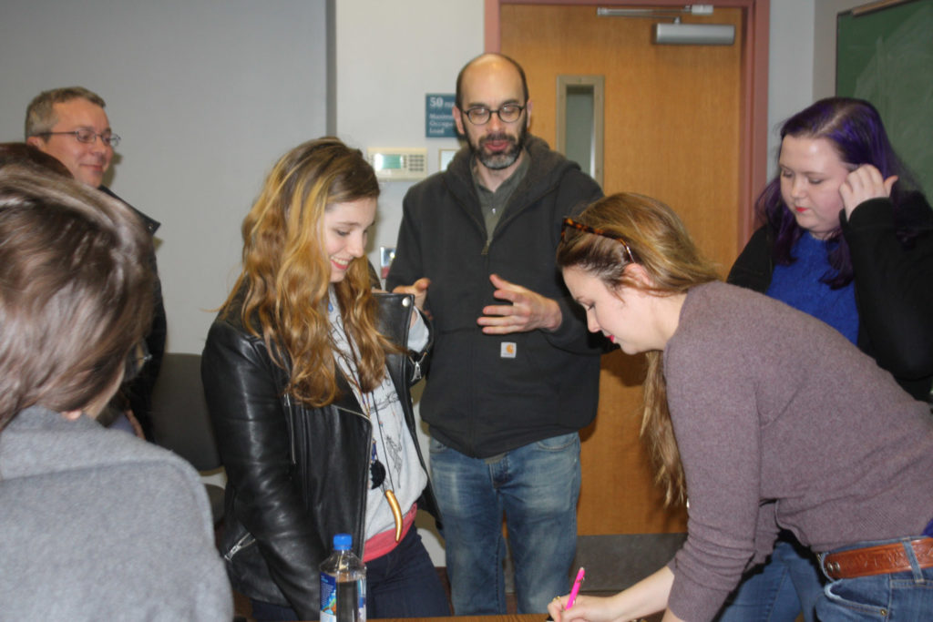 Montclair State professor Michael Robbins (center) acted as an editor for Tamblyn during her writing process. Photo Credit: Kristen Bryfogle
