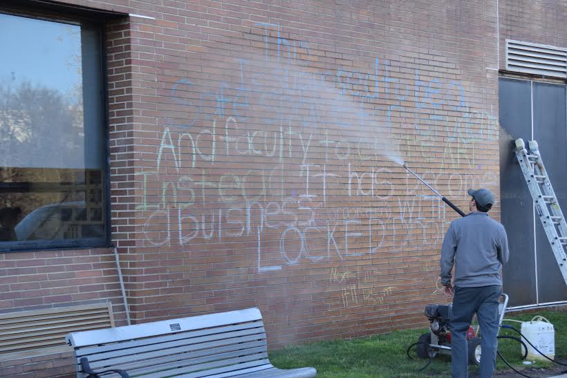 An outside company power-washed the graffiti off of the Calcia Hall walls and sidewalks. Photo Credit: Marty Keating