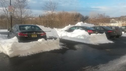 Cars snowed in at the commuter lot behind Alice Paul Hall. Photo Credit: Kristen Bryfogle