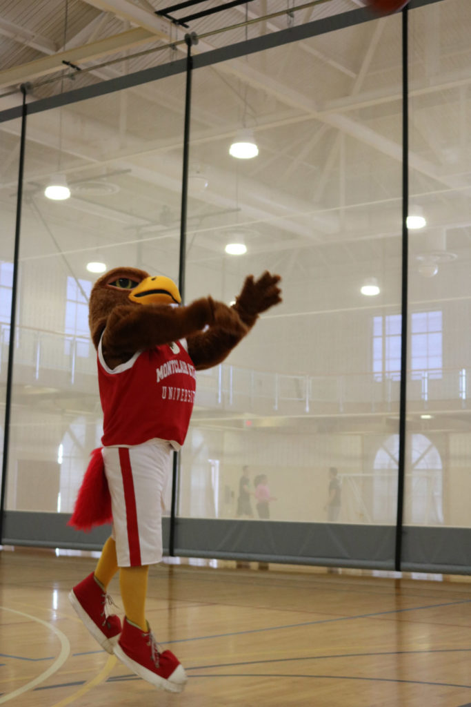 Rocky shooting hoops in the Student Recreation Center. Photo Credit: Daniel Falkenheim