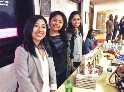 PRSSA Members at table selling tickets and merchandise. Photo Credit: Jessicca Bacher