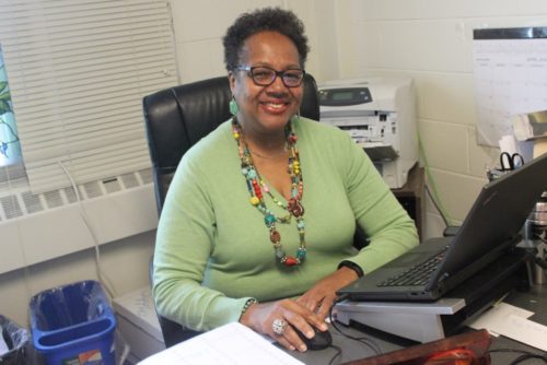 Delores McMorrin working in her office in Webster Hall. Photo credit: Teanna Owens