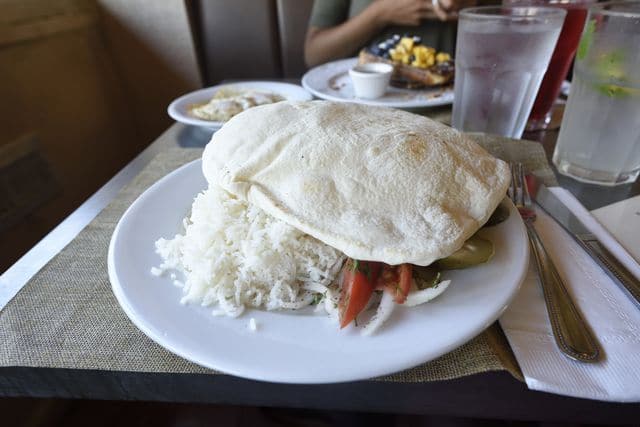 Beef shawarma with pita bread on top is a dish served at Uncle Momo, a Lebanese French bistro located in Montclair, N.J. Photo by Tunmise Odufuye