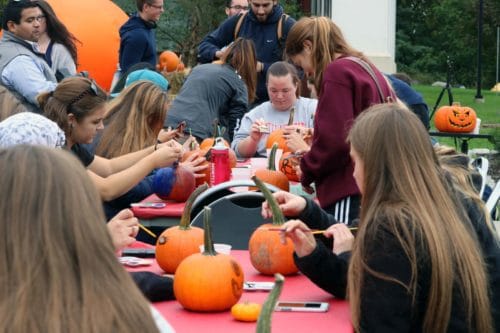Students painted pumpkins at SLAM. Photo Credit: Tess Reynolds