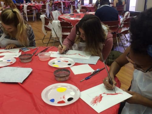 Students painted at a session held on campus last Saturday to celebrate Homecoming. Photo Credit: Alexandra Clark
