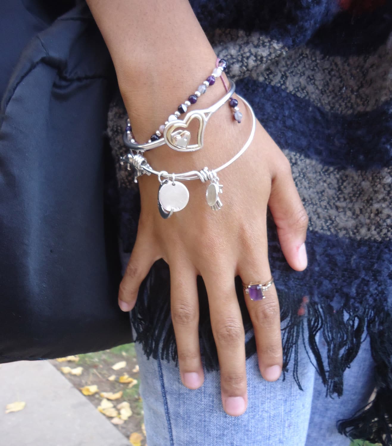 Montclair State student Bre'Yana Williams makes sure to accessorize with these silver bracelets and a violet gemstone ring. Photo by Carlie Madliner