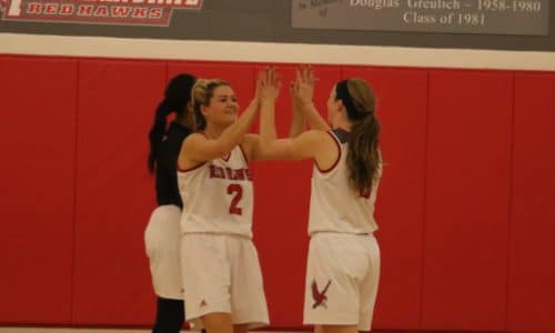 Senior guard Rachel Krauss (left) hit a go-ahead three pointer in the final moments against Rowan in the 2016 NJAC Championship. Photo by Therese Sheridan