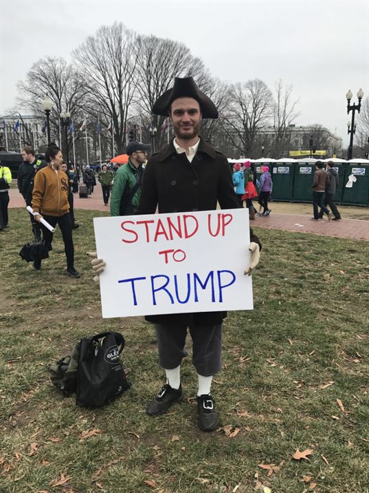 Anti-Trump protester urging people to stand up to Trump. Photo courtesy: Awije Bahrami