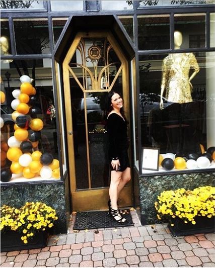 Jenna Davis in front of her boutique, That Little Black Dress. Photo Courtesy of Instagram Shopthatlbd