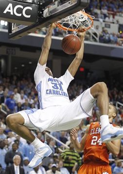 John Henson throws down a dunk during his time with UNC. Photo Courtesy of Bob Leverone