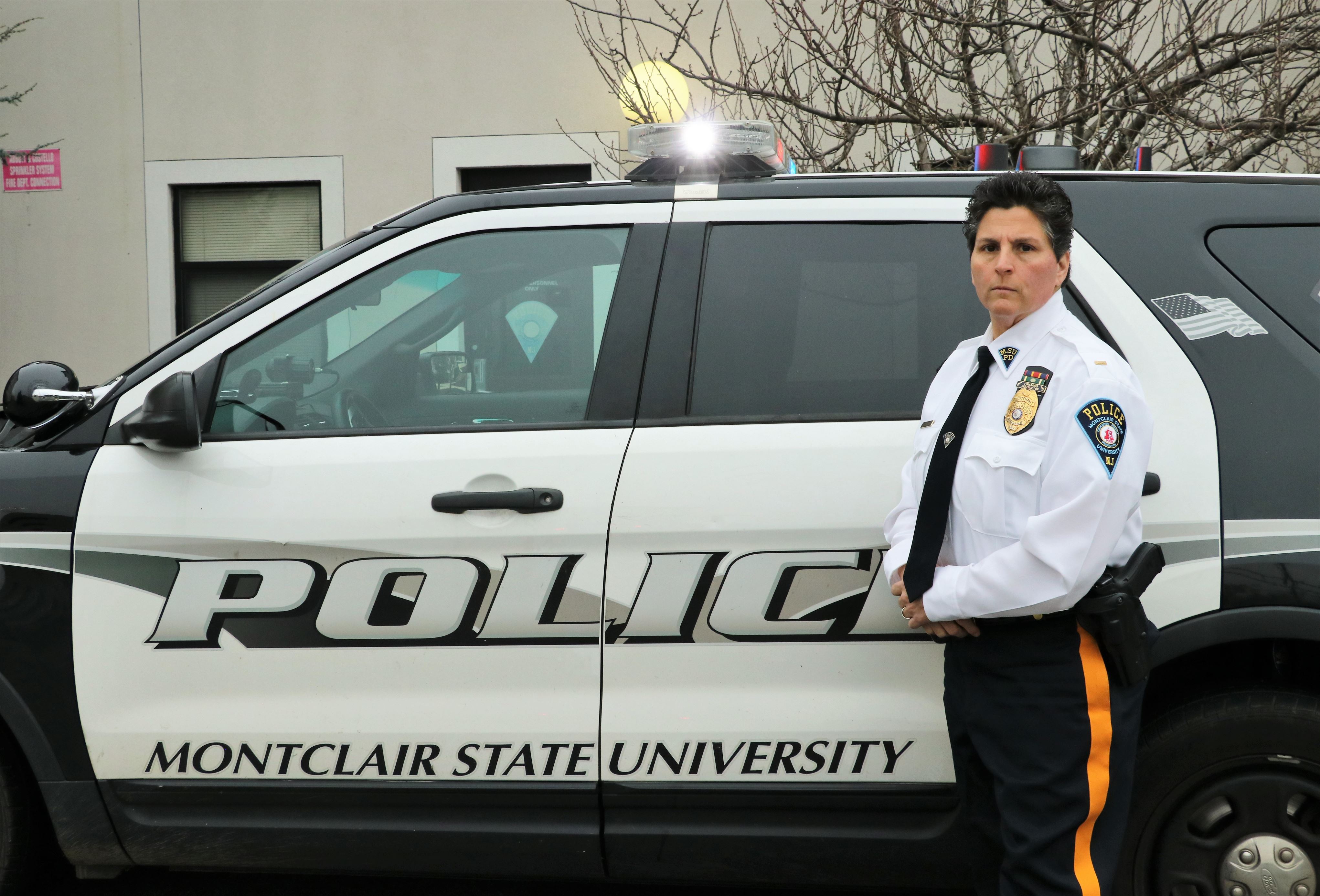 Lt. Giuliano stands with a UPD vehicle. Kristoffer Fernandes | The Montclarion