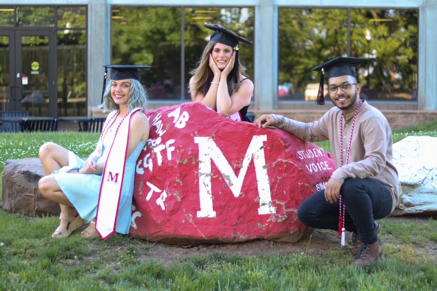Managing Editor, Editor-in-Chief and Web Editor pose on The Monclarion's rock. Adrian Maldonado | The Montclarion