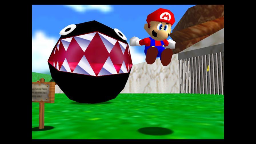 Mario deals with a Chain-Chomp in the Bob-Bomb's Battlefield level of Super Mario 64.