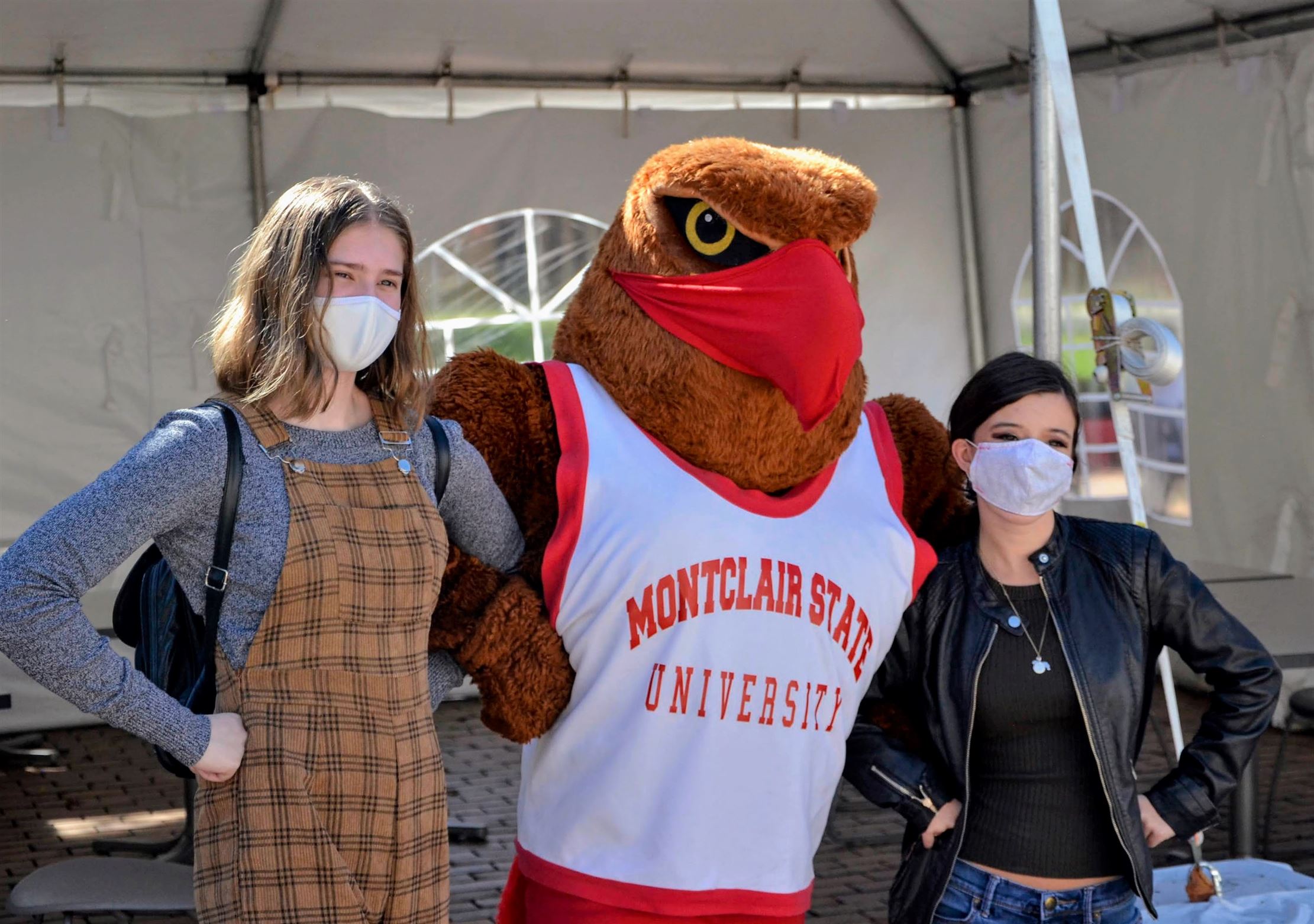 Montclair State students Rebecca Kobik and Danielle Tufariello strike a pose with Rocky during University Day festivities, on Oct. 14, 2020. Photo courtesy of John LaRosa