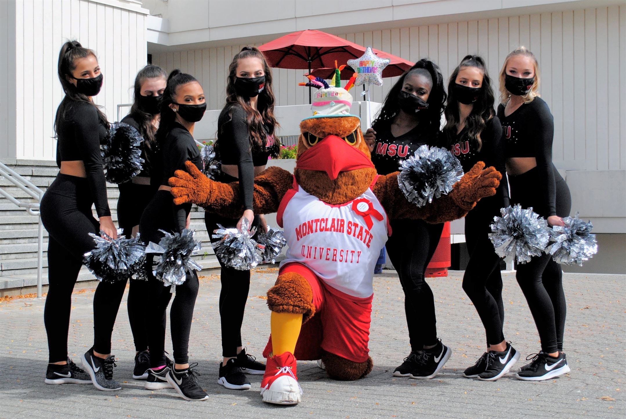 The Montclair State University Dance Team poses with Rocky outside of the Student Center. Michael Giannotti | The Montclarion