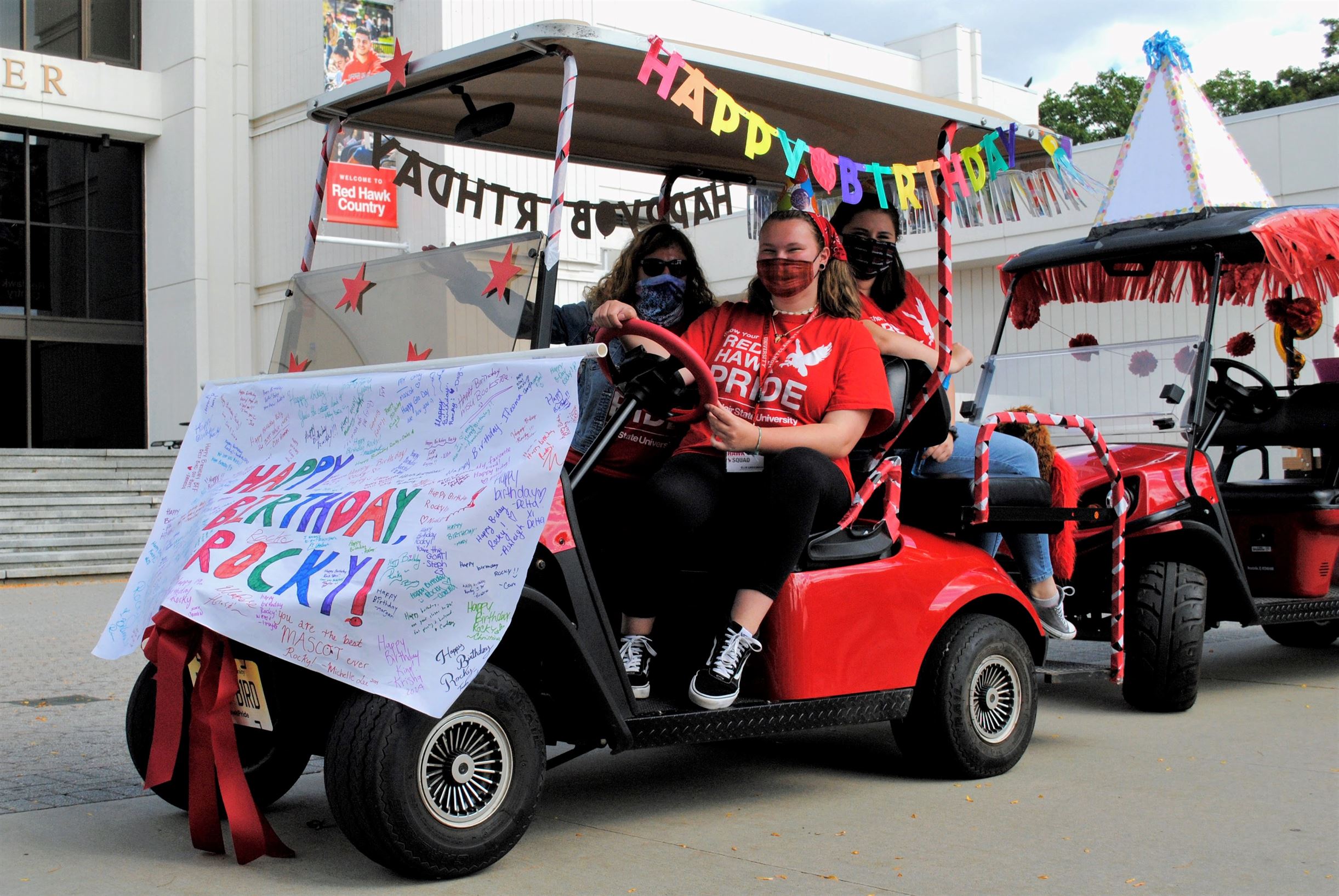 Team Rocky's senior psychology major Grace Ehrline, freshman Ellie Gressman and junior political science/German language major Sammi Gerbrick get ready to roll out for Rocky's birthday parade. Michael Giannotti | The Montclarion