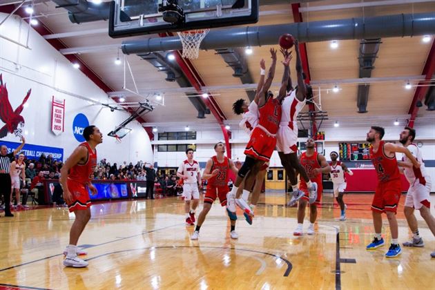 The Red Hawks face some resistance in the paint during a game against William Paterson University during the 2019-20 season. Chris Krusberg | The Montclarion