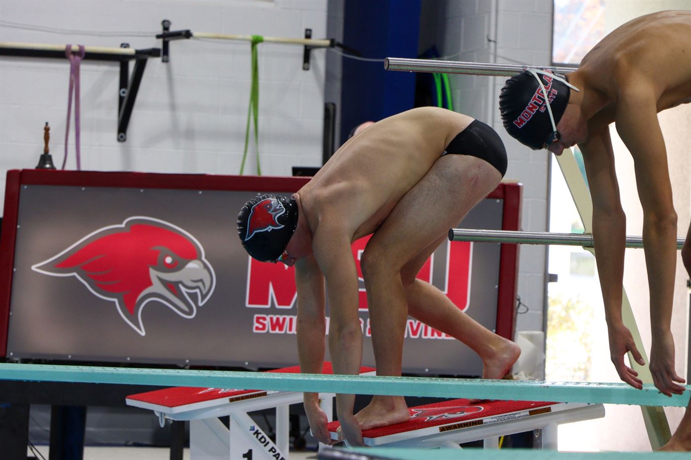 Sophomore Samuel Golovin on the block waiting for the start of the 50 free freestyle. Photo courtesy of Matthew Unczowsky