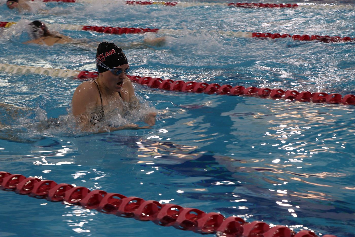 Sophomore Dani Holmes taking part in the 200 individual medley. Photo courtesy of Matthew Unczowsky