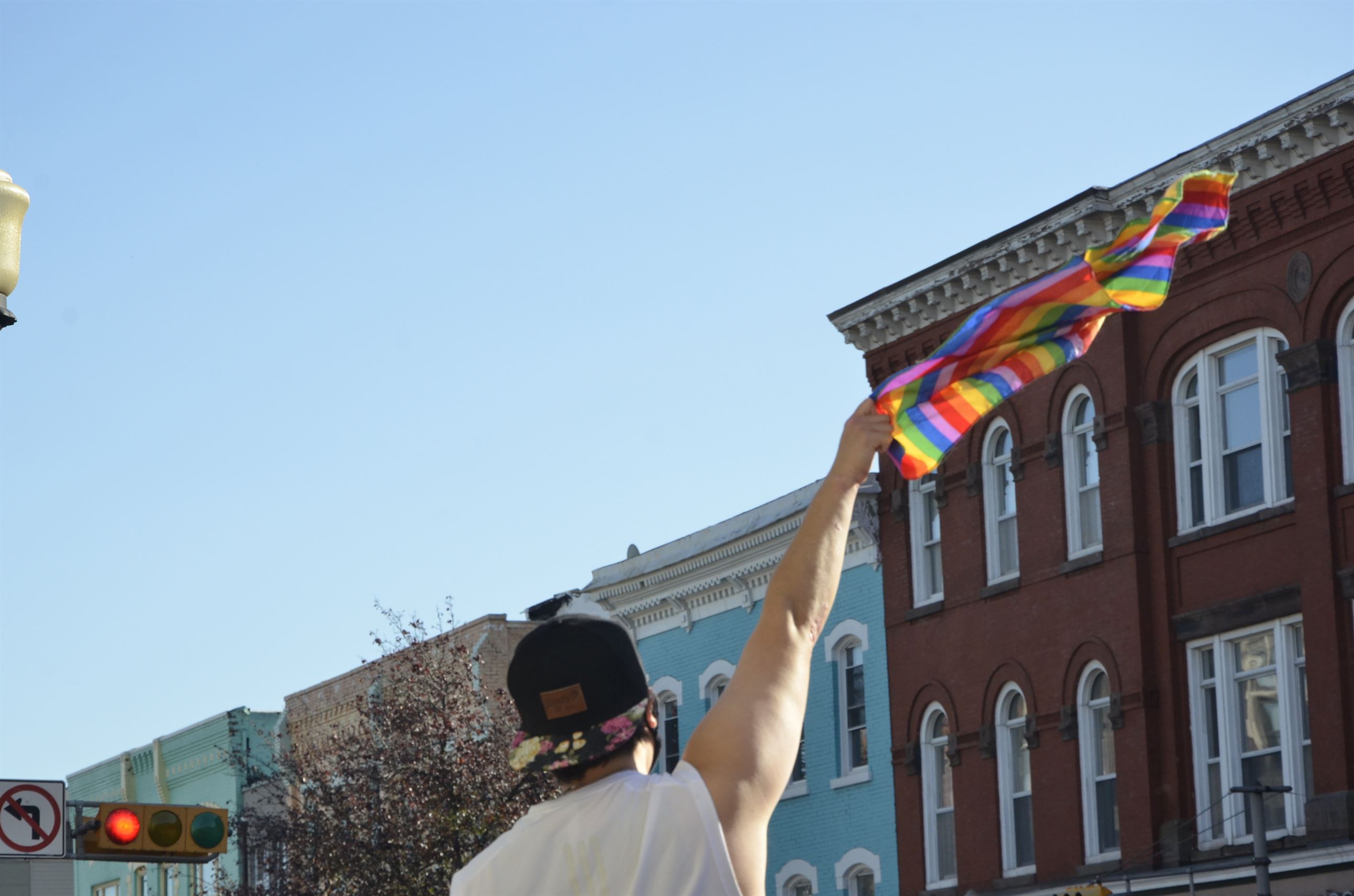 A man waves a pride flag for all of Montclair to see. John LaRosa | The Montclarion