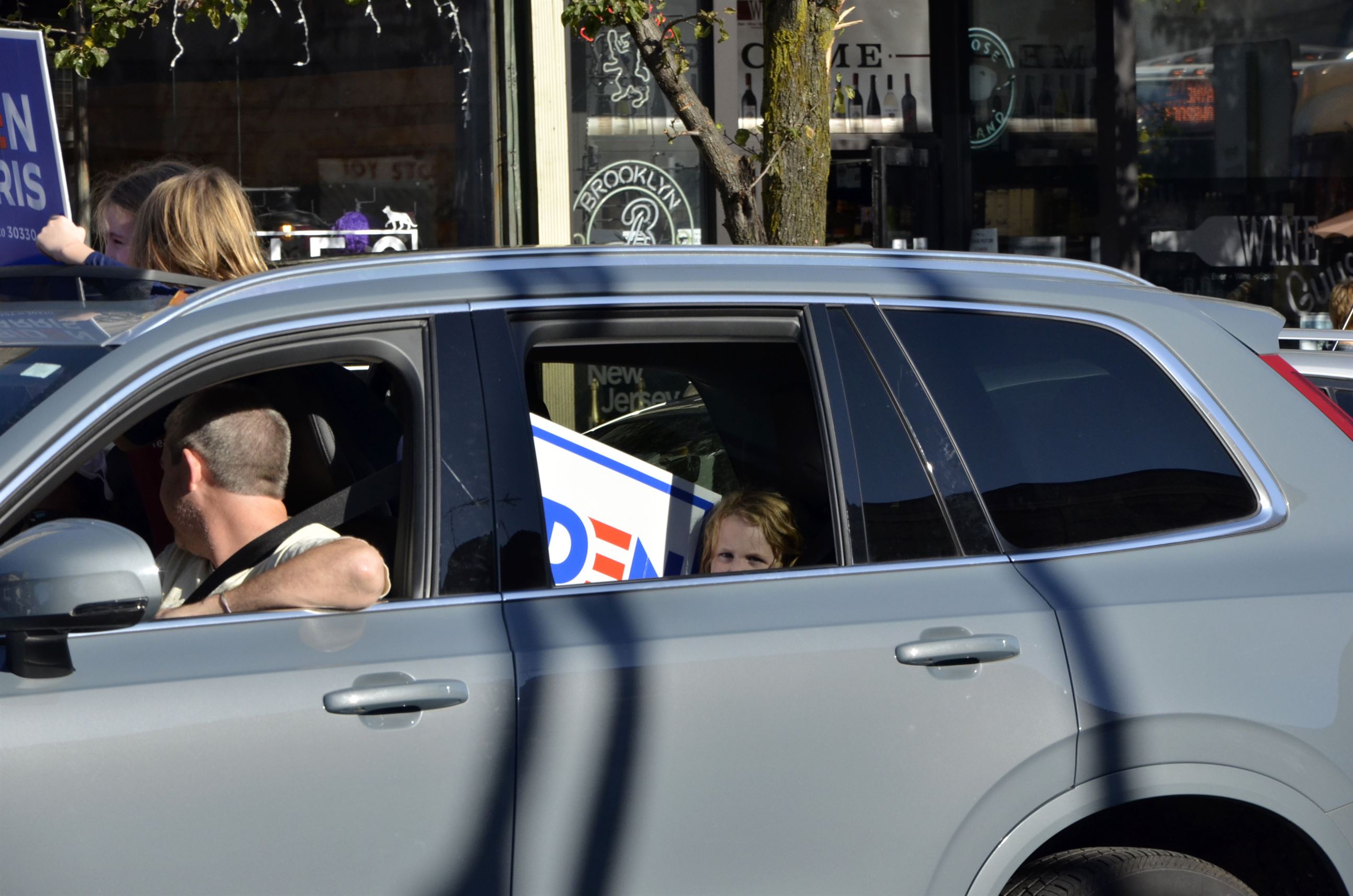 A family of Biden supporters drive through downtown Montclair. John LaRosa | The Montclarion