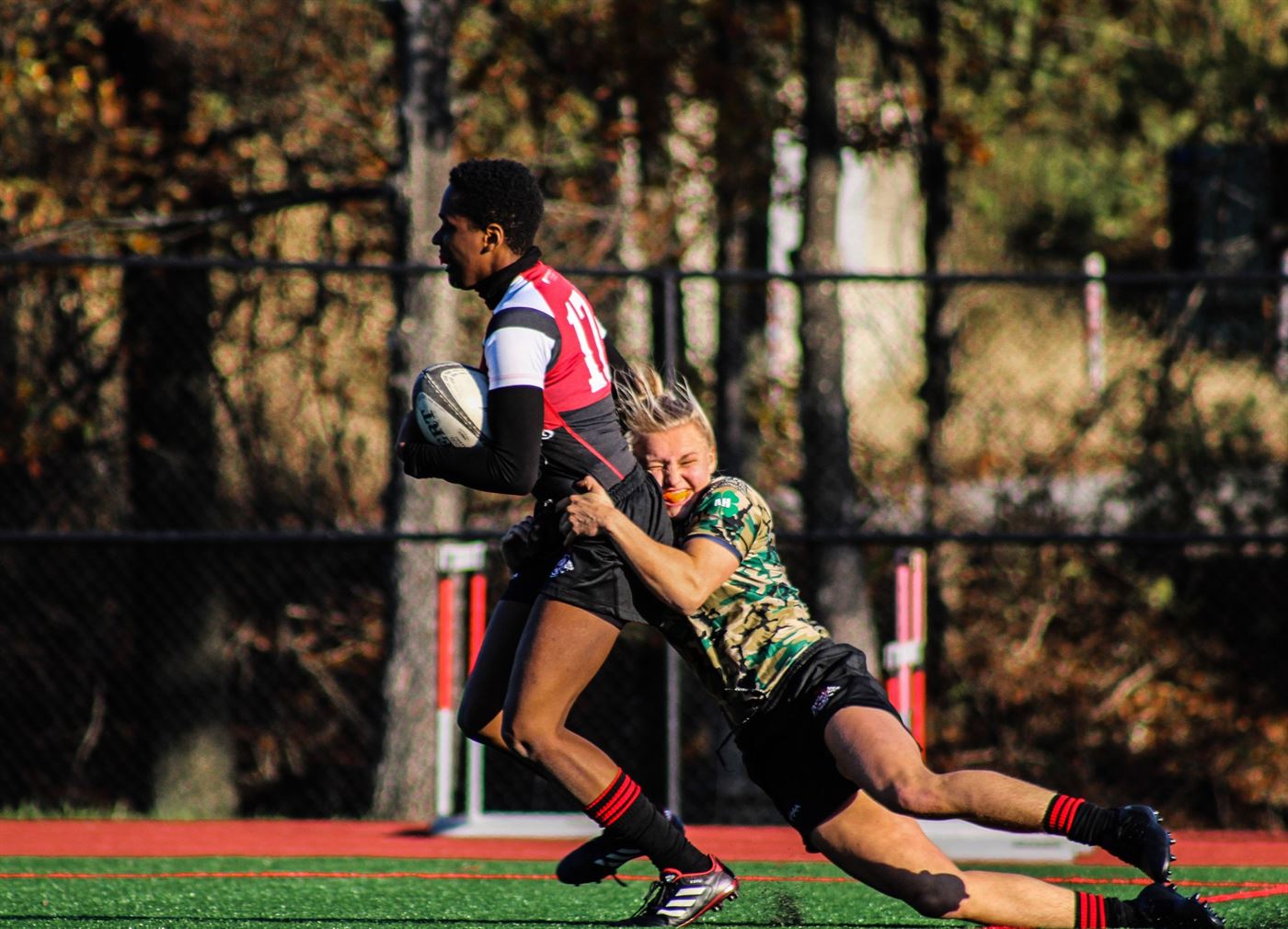 Junior flanker/lock Jane Carino chases down an opposing player. Corey Annan | The Montclarion