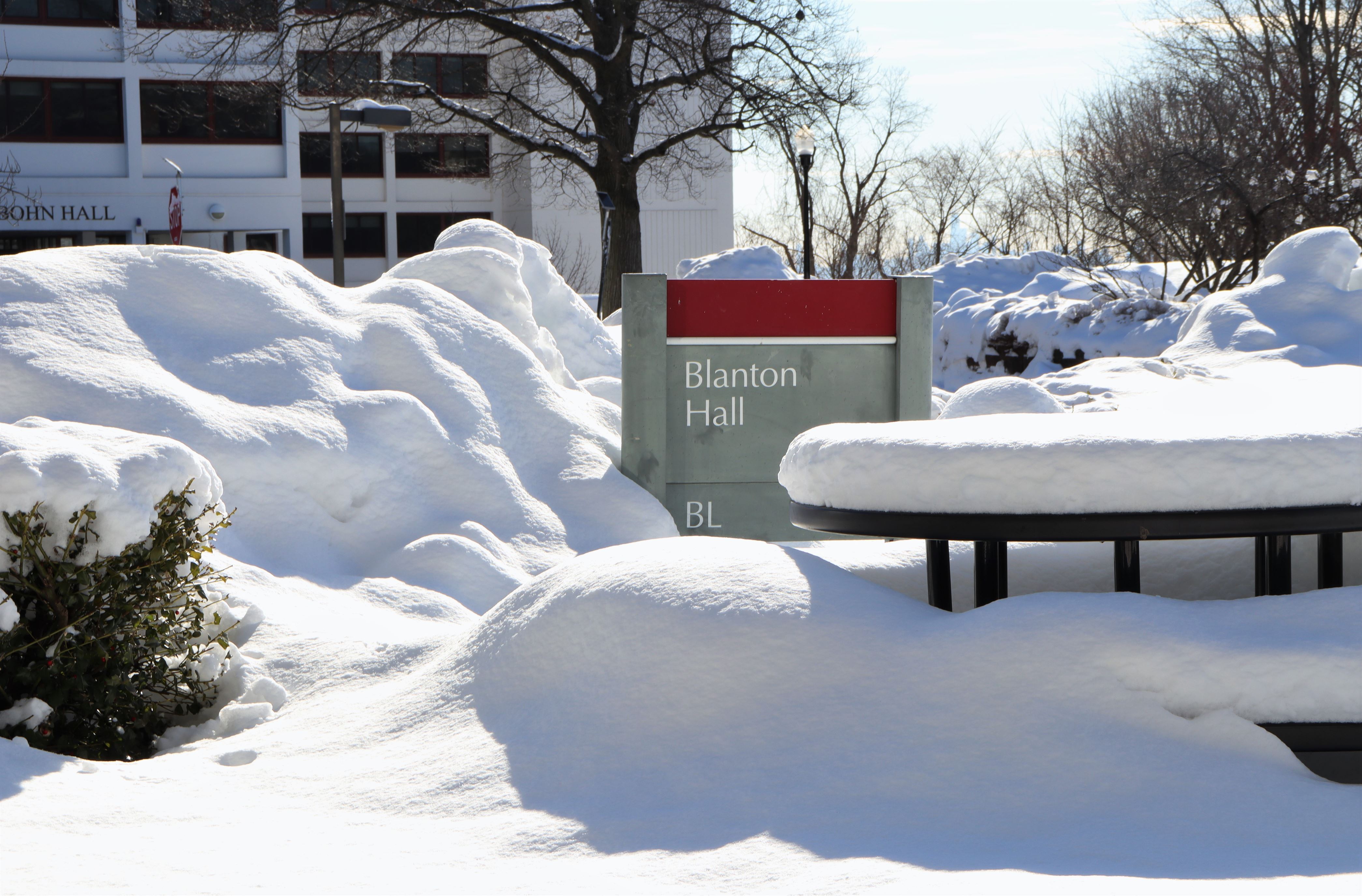 A buried sign outside Blanton Hall giving an idea of how much snow accumulated during the last storm. John La Rosa | The Montclarion