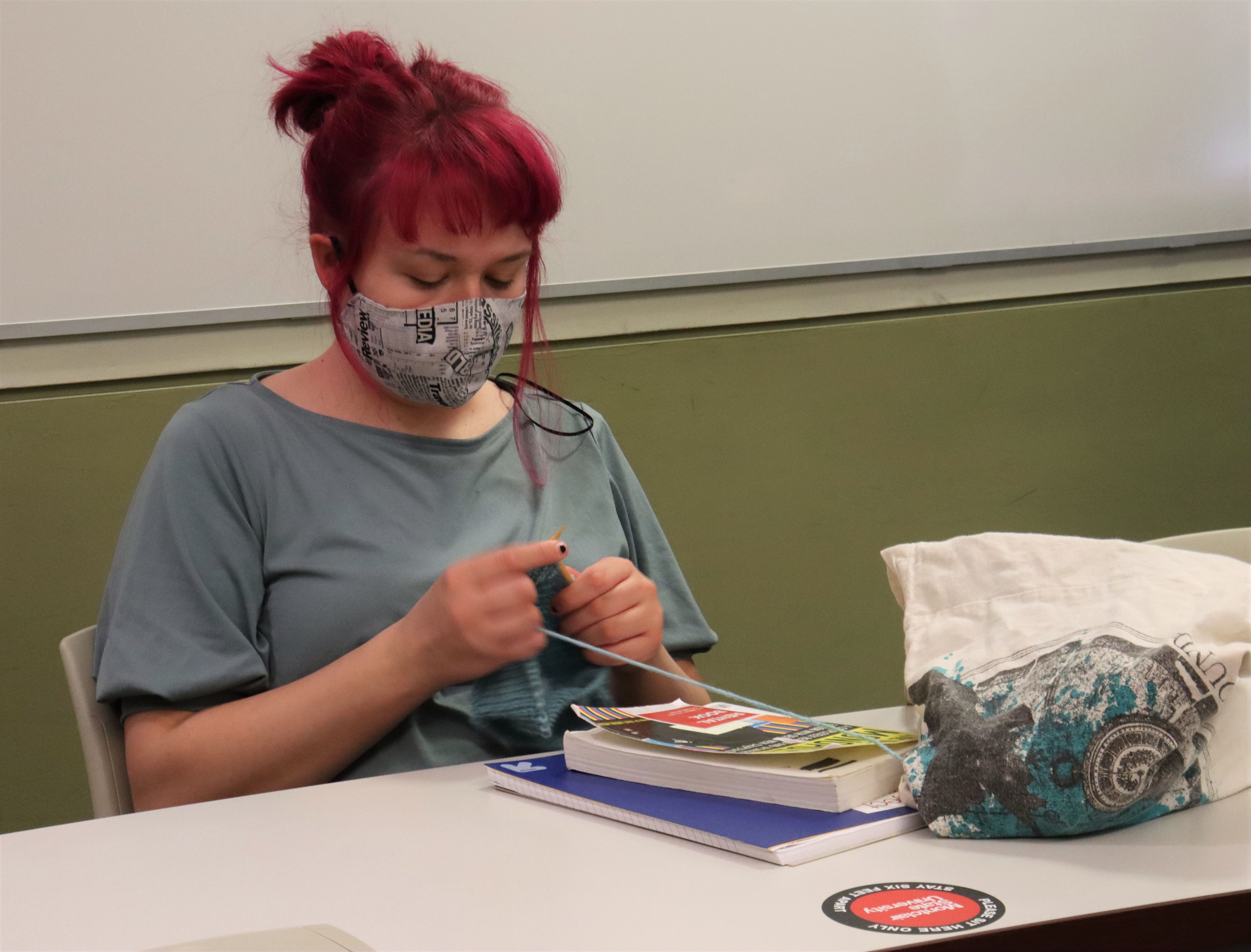 Carley Campbell, a sophomore journalism major, knits before class to help pass the time. John La Rosa | The Montclarion