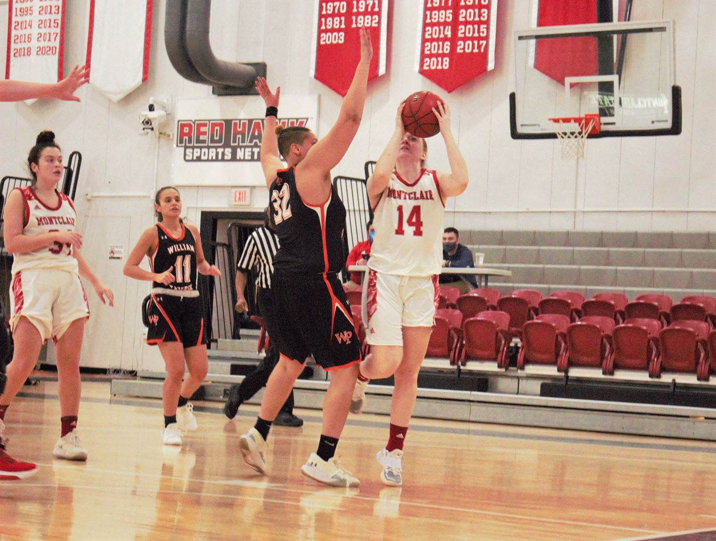 Red Hawks sophomore guard Nickie Carter looks to shoot over a defender.