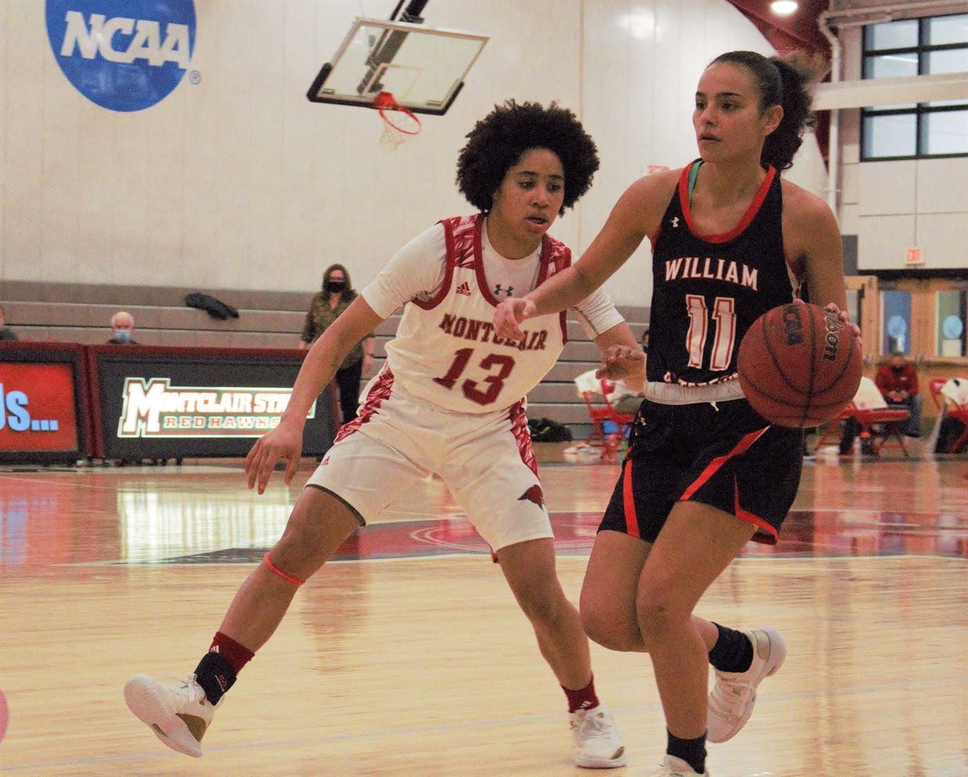 Red Hawks freshman guard Kendall Hodges closely guards a William Paterson player.