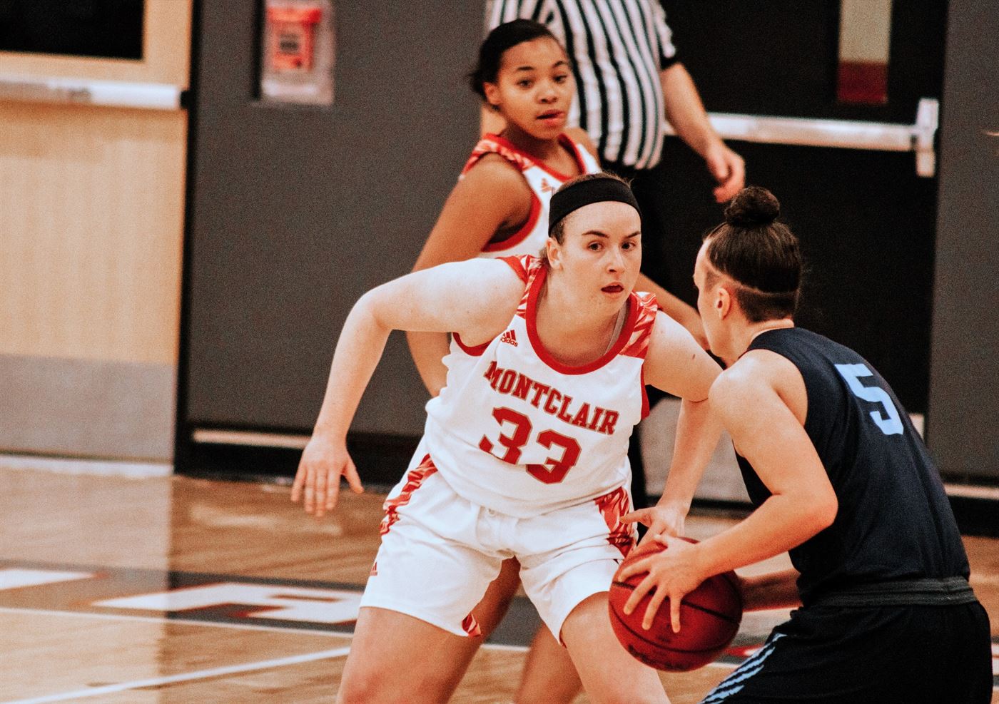 Red Hawks junior forward Annie Walsh closely defends a Kean player near the paint. Photo courtesy of Julia Radley