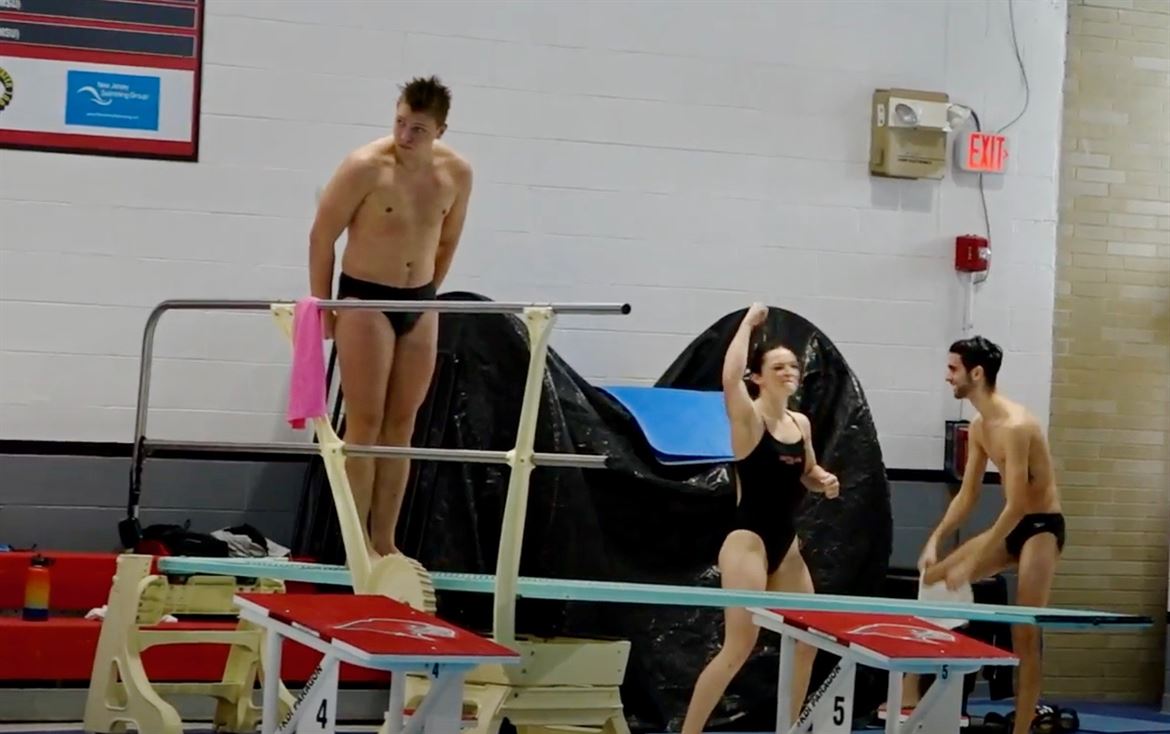 Senior Ian Johnson gets set for the final dive of the meet. Photo courtesy of Kayla Francione