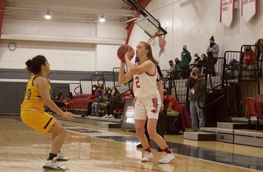 Red hawks senior guard and captain Taylor Brown rises up for a three-pointer. Photo courtesy of Caitlyn Hughes
