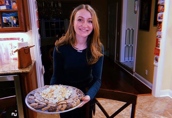 Alyssa Bussanich poses with some of her baked goods. Photo courtesy of Alyssa Bussanich