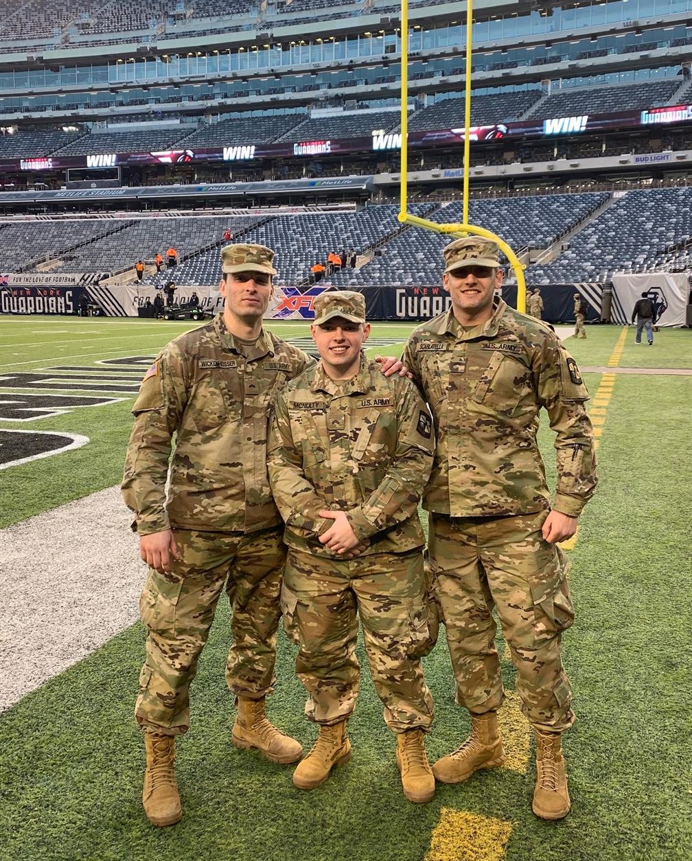 Scarlatella and two cadet classmates being honored at MetLife Stadium. Photo courtesy of Vinny Scarlatella