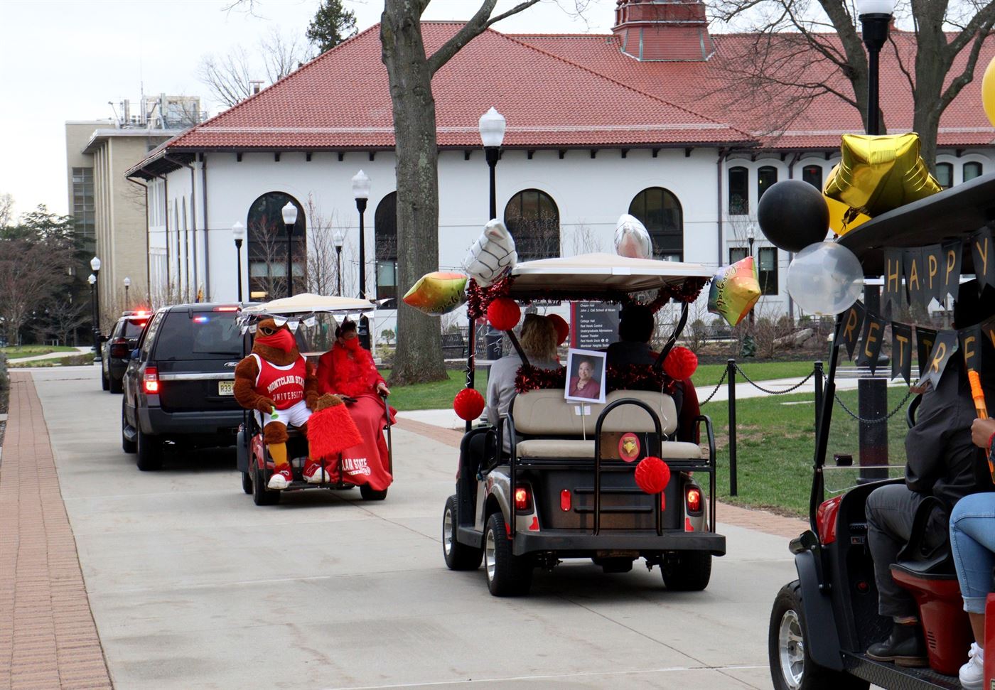 Rocky and Dr. Pennington, along with other faculty members enjoyed the parade on golf karts, escorted by University Police. John LaRosa | The Montclarion