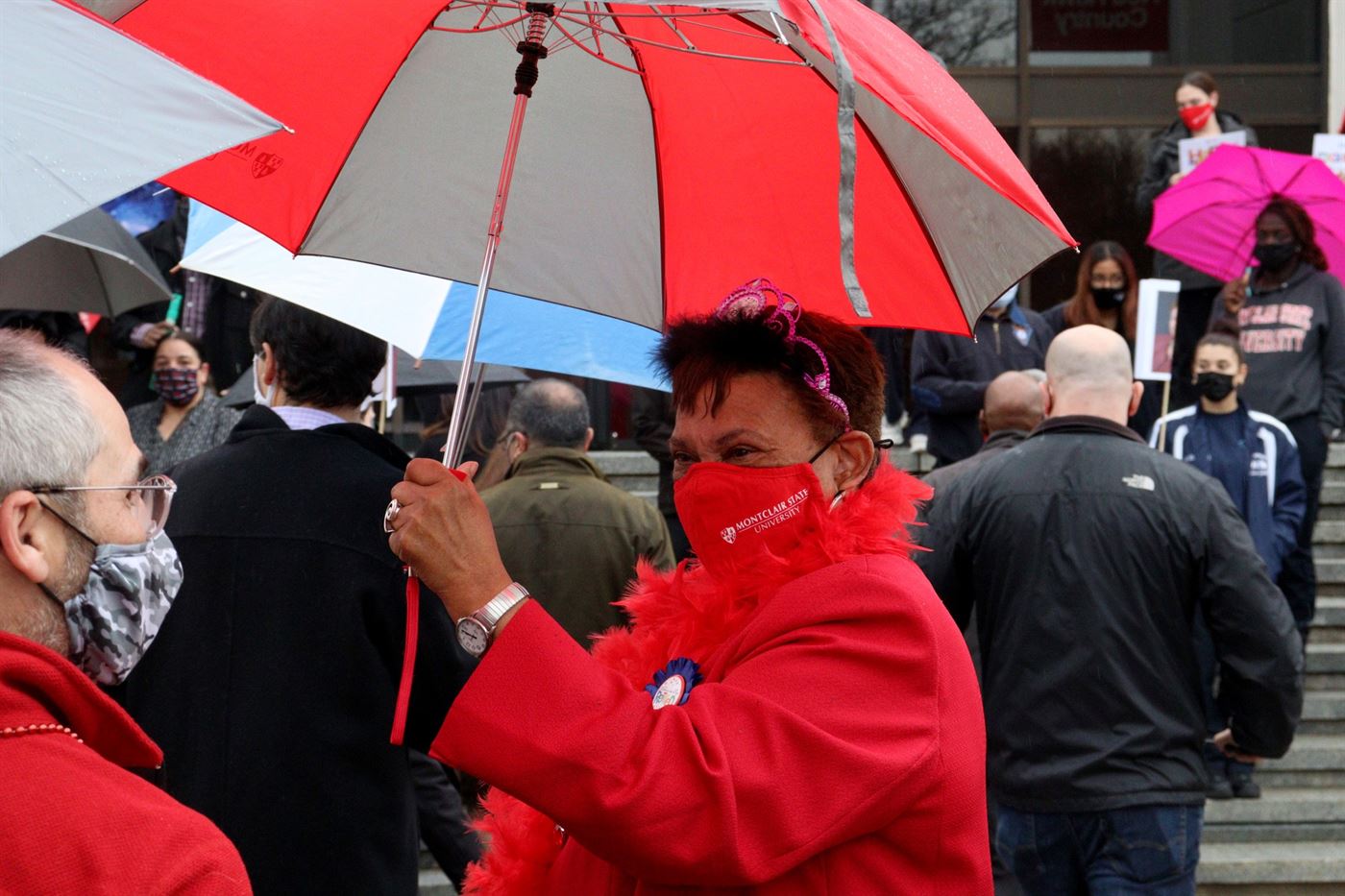 The forecast called for rain, but only at the very end of the parade did it start pouring. Dr. Pennington came prepared. John LaRosa | The Montclarion