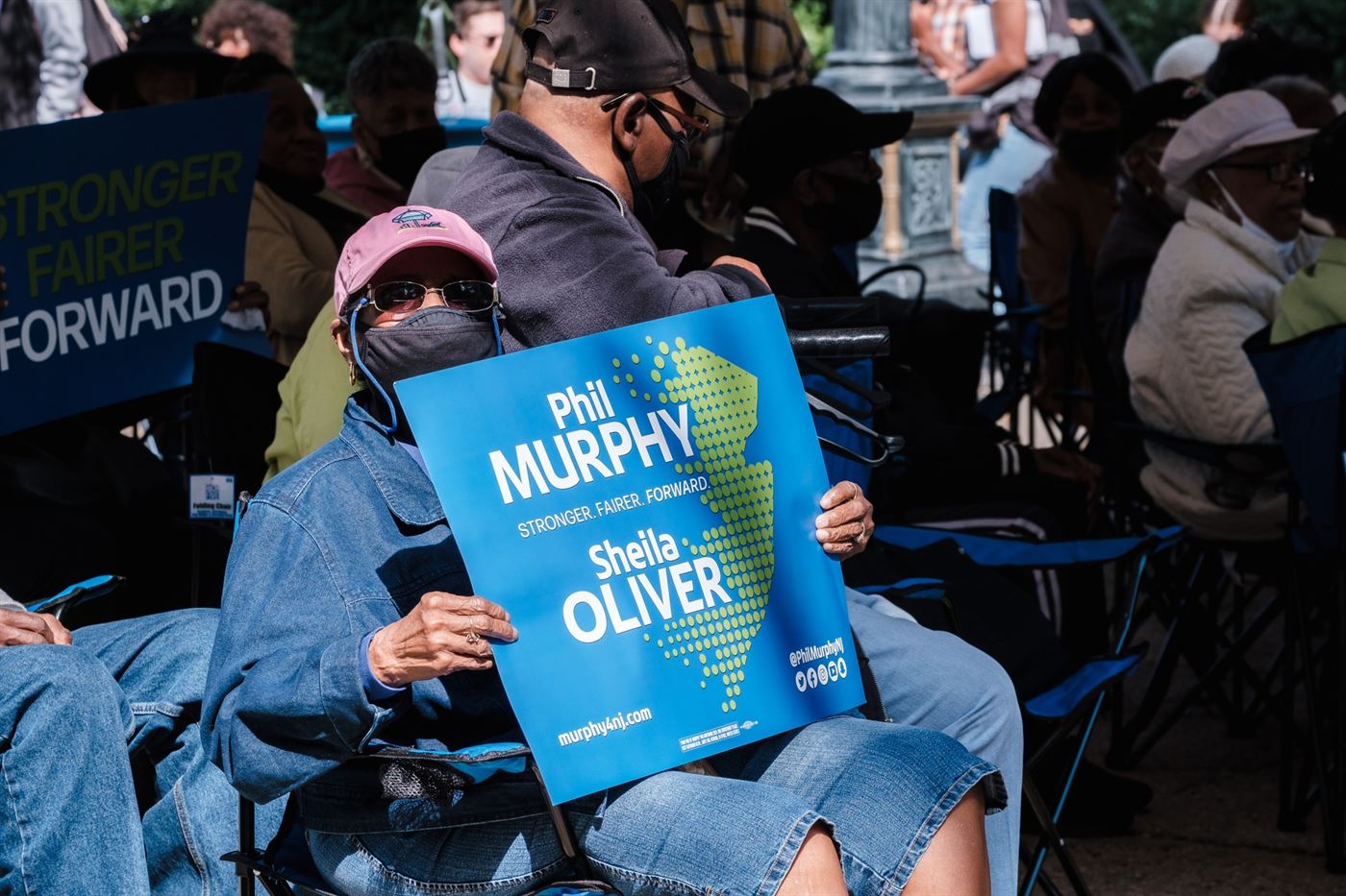 One of the many attendees showing their support to Phil Murphy and Sheila Oliver. Michael Callejas | The Montclarion