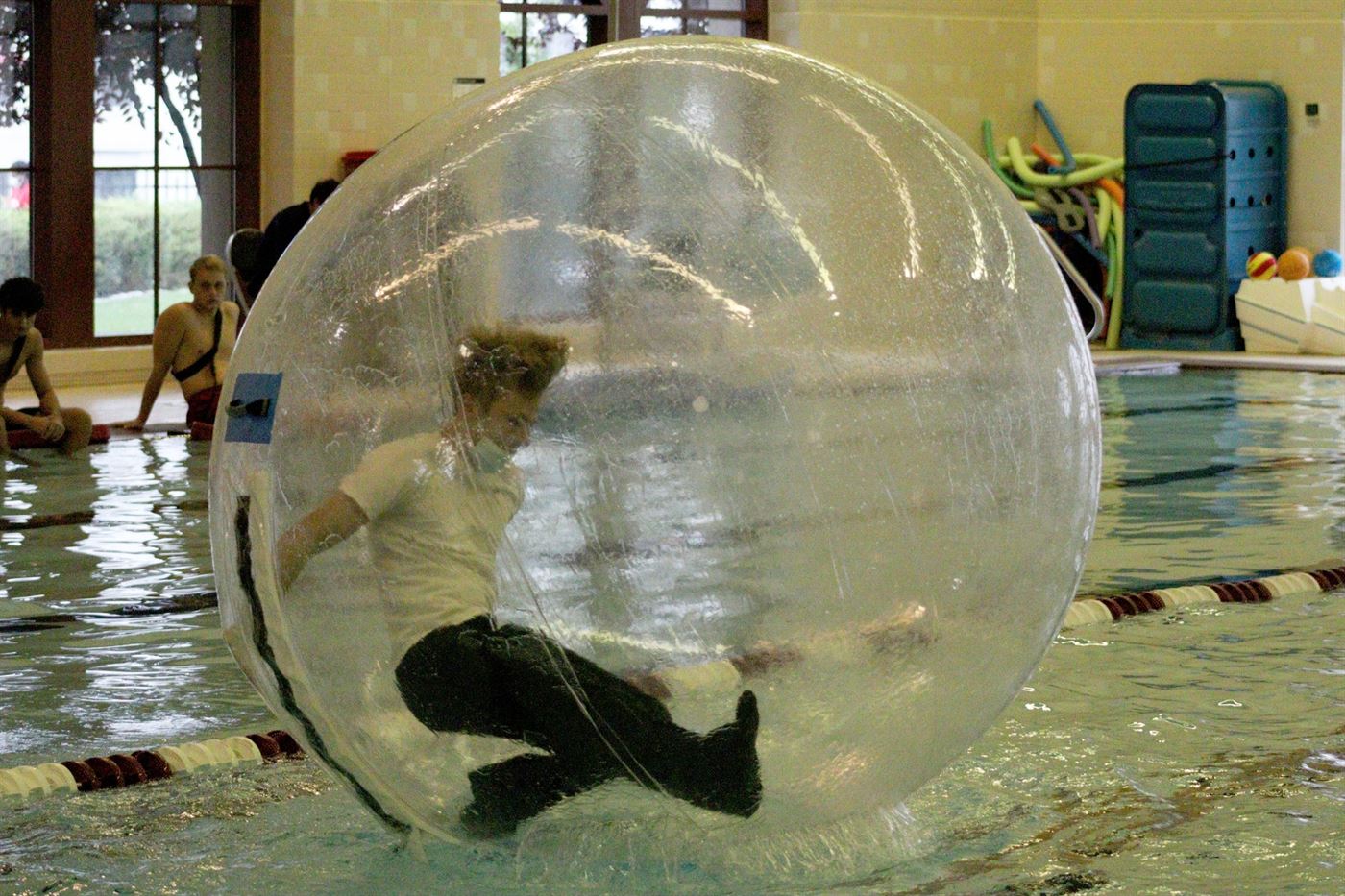 A student playing in the Hamsters Ball at the Student Rec Center pool. John LaRosa | The Montclarion