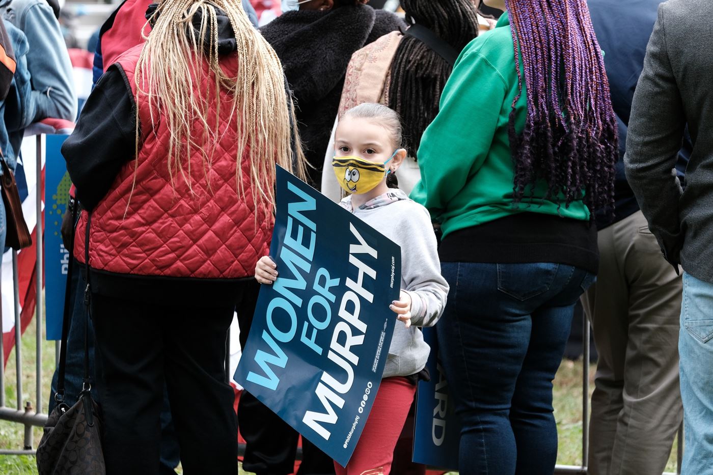 A child holding a "Women for Murphy" sign. Michael Callejas | The Montclarion