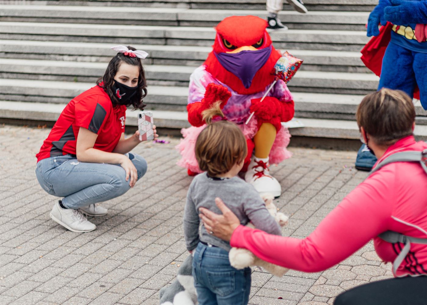 Future Red Hawk greets Rocky's family outside of the Student Center. Photo courtesy of Karsten Englander