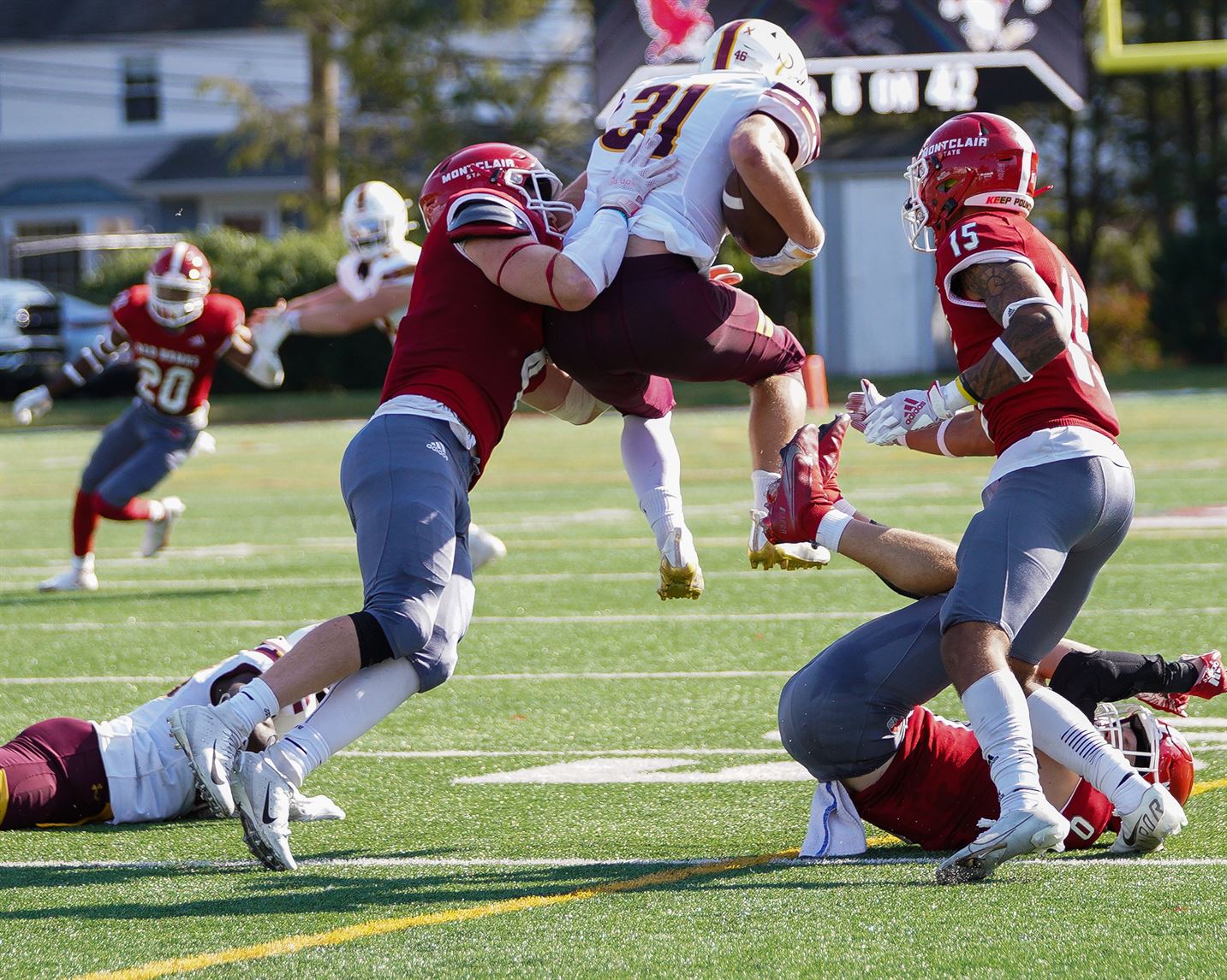 A Salisbury player leaps over a Montclair State defender.