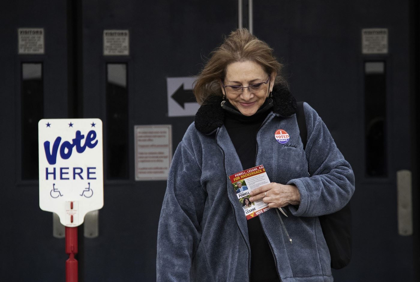 Hackensack resident leaves the polling place in Hackensack, New Jersey with a smile on Election Day. Day. Michelle Coneo | The Montclarion