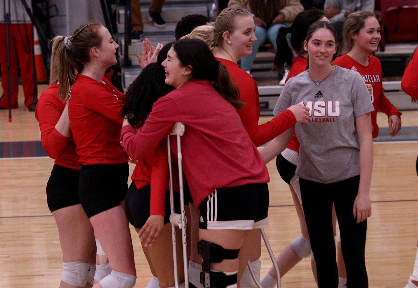 The Montclair State women's volleyball team celebrating their victory. John LaRosa | The Montclarion