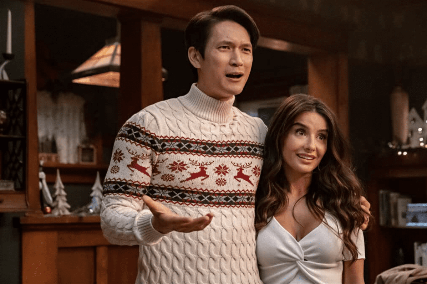Harry Shum Jr. and Mikaela Hoover portray a married couple in "Love Hard." Photo courtesy of Netflix