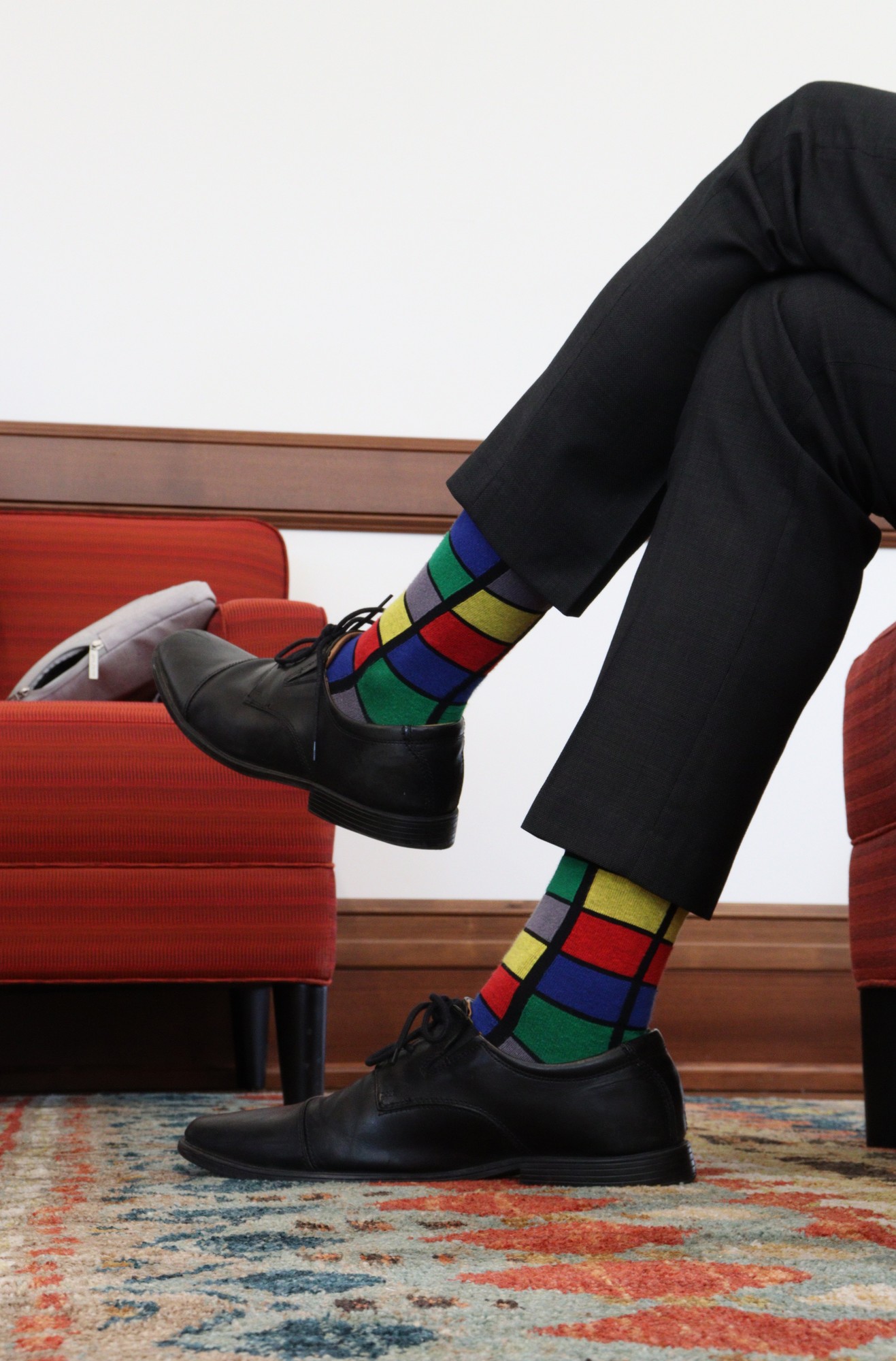 President Koppell wearing Rubix Cube socks. Koppell says fun socks make his days more interesting, and loves seeing students wearing interesting socks. John LaRosa