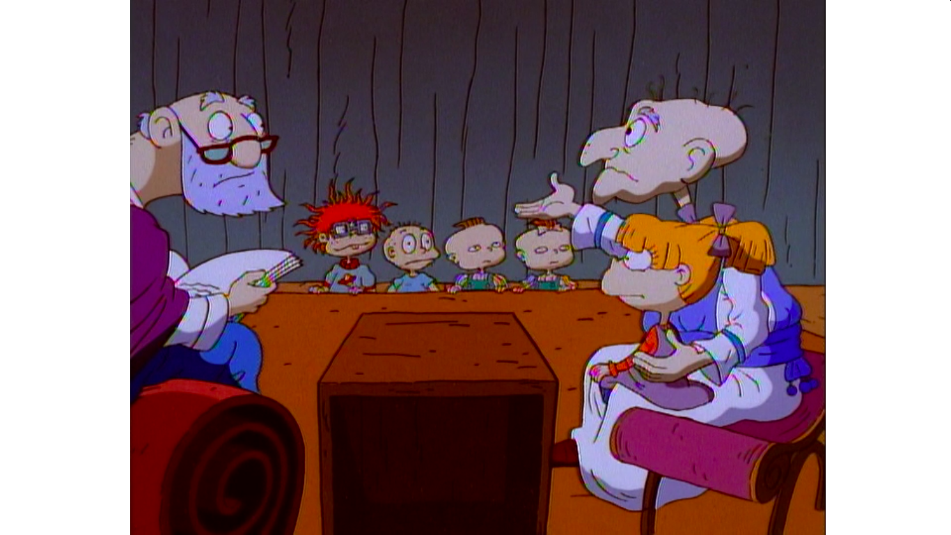 Tommy and his friends are read the story of Hanukkah by his Grandpa Boris (right) and his "Uncle" Schlomo in the "Chanukah" episode of "Rugrats." Photo courtesy of Nickelodeon